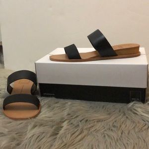 Leather two strap sandals.